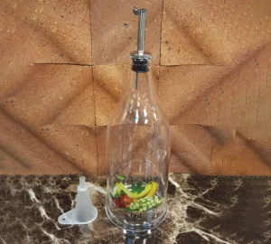 بطری شیشه ای یک لیتری روغن با سری استیل