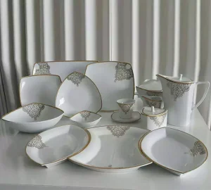 فروش عمده سرویس چینی پردیس طرح نارنیا طلایی 105 پارچه